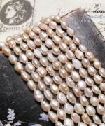 天然A級強光仙女粉隨形米形淡水珍珠